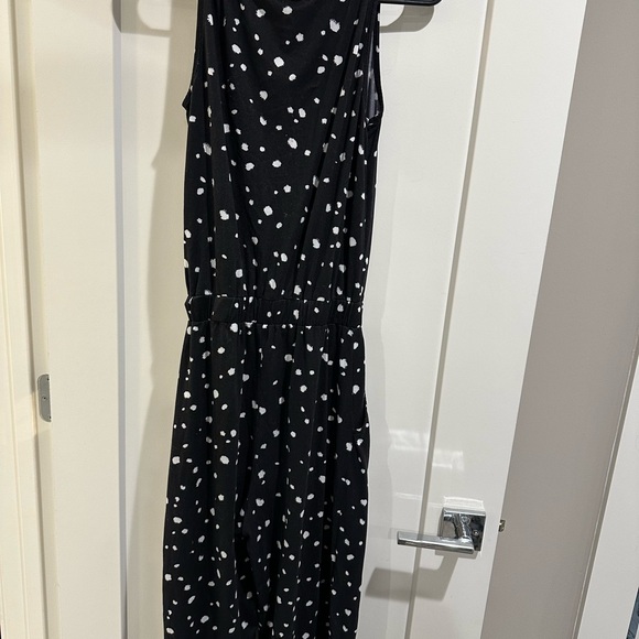 Black and white flowy jumpsuit- size small. Has pockets. - Picture 5 of 5